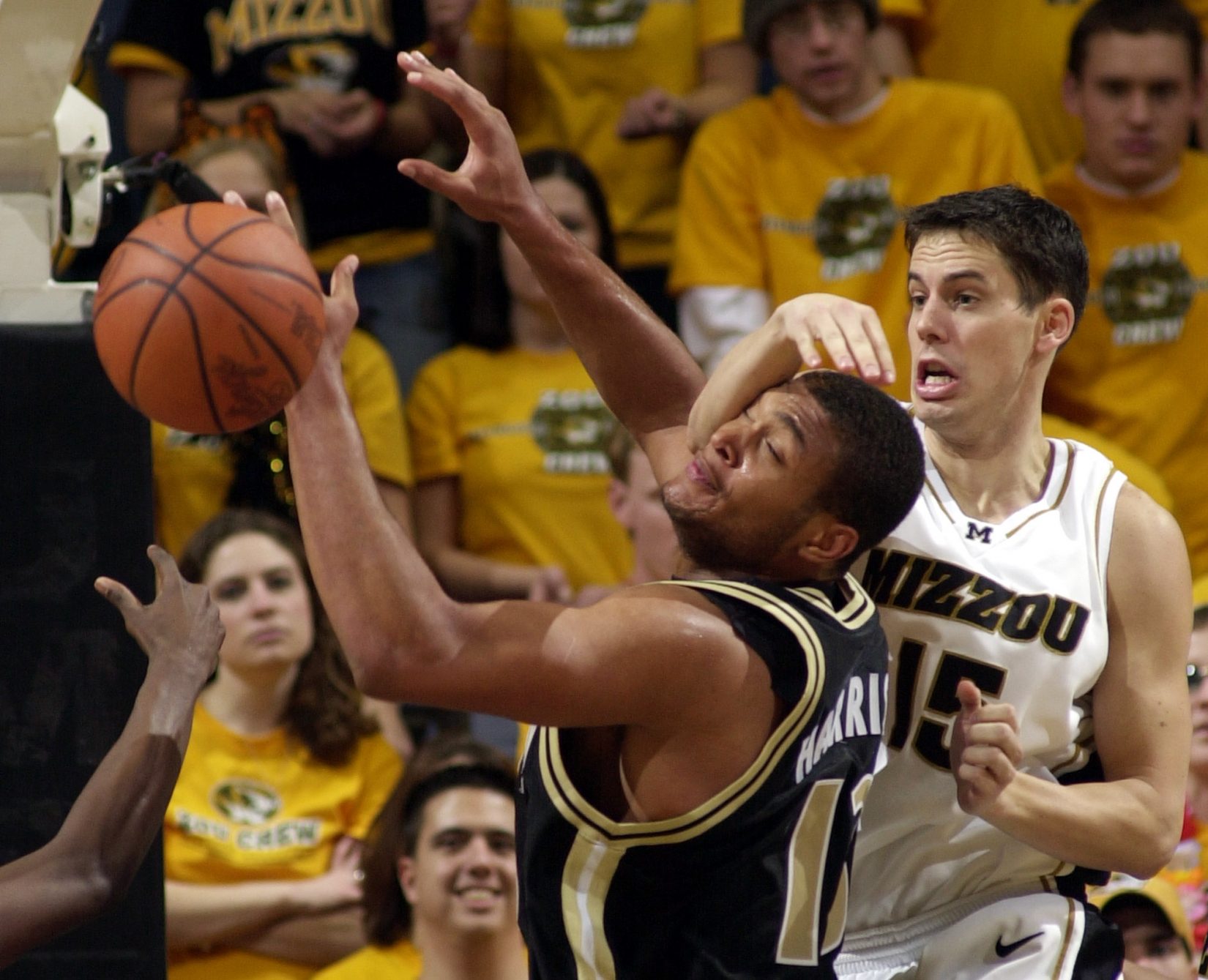 In this 2003 file photo, Missouri's Josh Kroenke, right, smacks Colorado's David Harrison, left, in the head as they battle for a rebound. (AP Photo/L.G. Patterson)