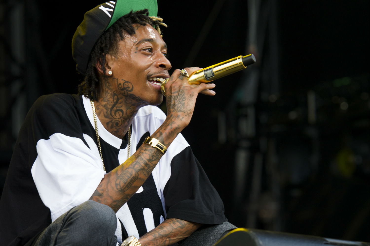 Wiz Khalifa will tell you just how much pot Miley Cyrus ingests. (Charles Sykes, Invision/AP)