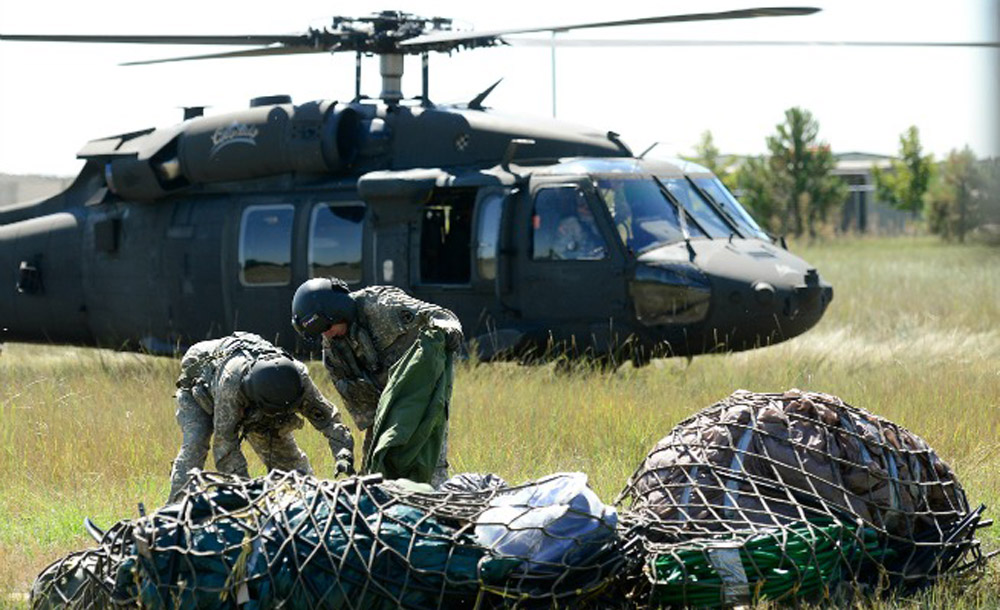 Black Hawk helicopter airlifting marijuana out of illegal Boulder County grow
