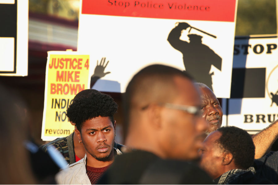 Demonstrators prepare to march toward the Ferguson, Mo., police station on Oct. 22 as protests continue in the wake of 18-year-old Michael Brown's death. (Scott Olson, Getty Images)