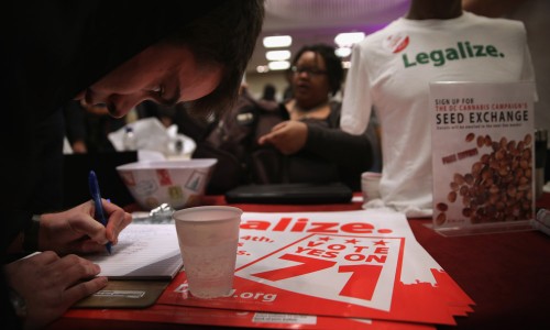 An attendee signs up for a seed exchange event during a ComfyTree Cannabis Academy conference Feb. 28, 2015 in Washington, D.C. (Alex Wong, Getty Images)