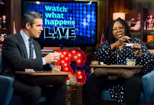 Whoopi Goldberg teaches Andy Cohen how to roll a joint. (Bravo)