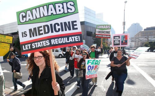 Demonstrators march in November 2011 to protest the federal government's crackdown on California medical marijuana dispensaries during a rally in Sacramento, Calif., at the Robert T. Matsui Federal Courthouse. (Rich Pedroncelli, Associated Press file)