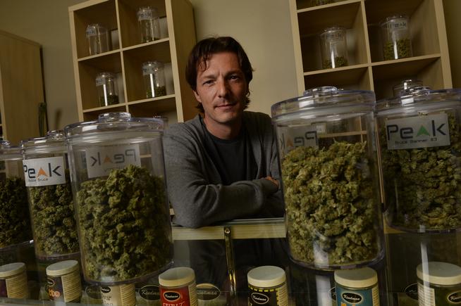 Justin Henderson, owner of Peak Marijuana Dispensary in Denver, estimates that his business is split 50-50 between residents and out-of-staters. (Helen H. Richardson, The Denver Post) 