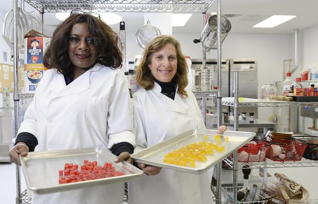 Owners Deloise Vaden, left,  and Elyse Gordon in the kitchen of  their Better Baked marijuana edibles kitchen in Denver