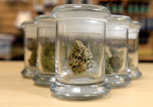 A bud sits in a display jar at the Helping Hand marijuana store in Boulder on Sept. 16, 2015. (Jeremy Papasso, Daily Camera)