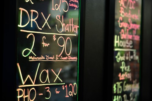 Prices for cannabis concentrates are on display at The Colfax Pot Shop, a recreational marijuana shop located in Denver. (Vince Chandler, The Denver Post)