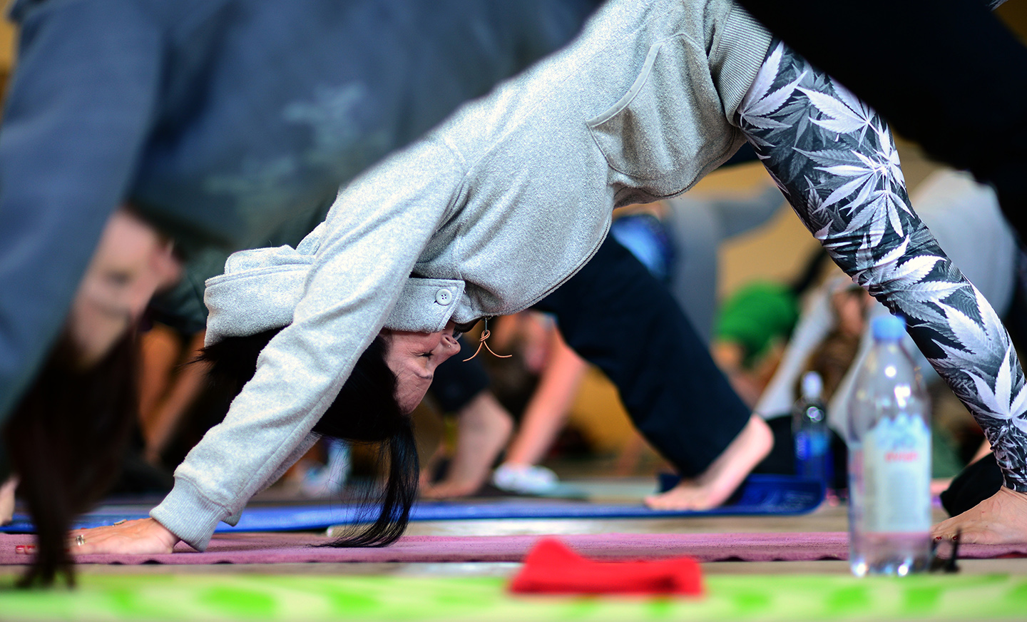 Mason Jar Event Group founder Kendal Norris practices yoga at Yoga With A View on May 15 2016. The event paired carefully selected marijuana strains with yoga and a multiple course brunch. (Vince Chandler, The Denver Post)