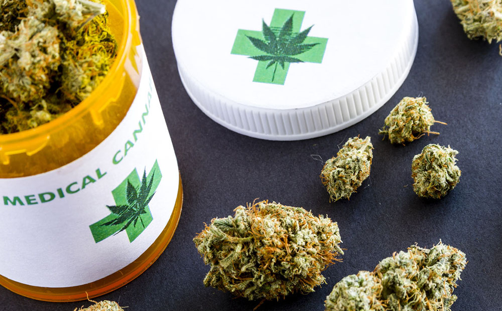 Medical marijuana buds in prescription bottle